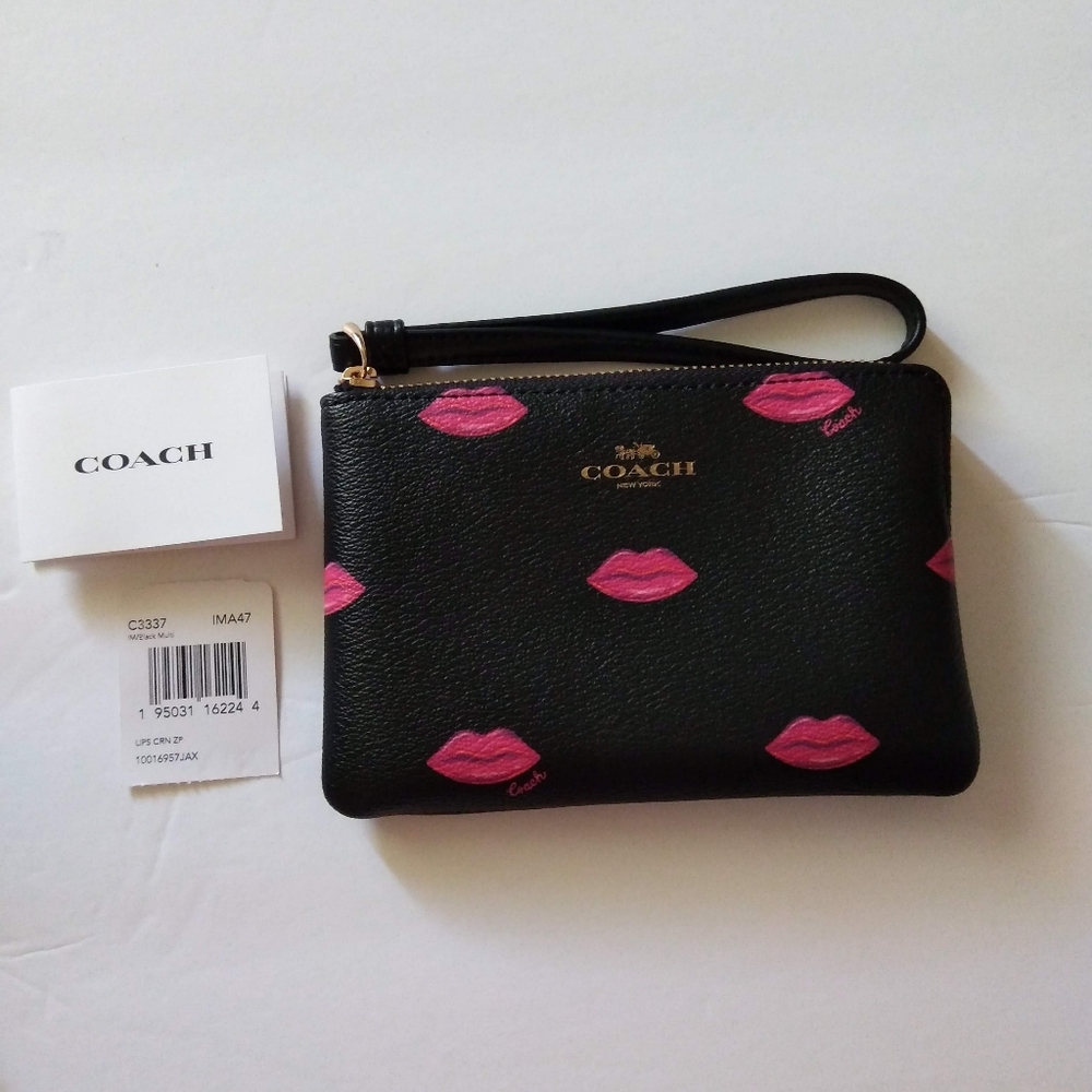 Coach Pink Lips Wristlet